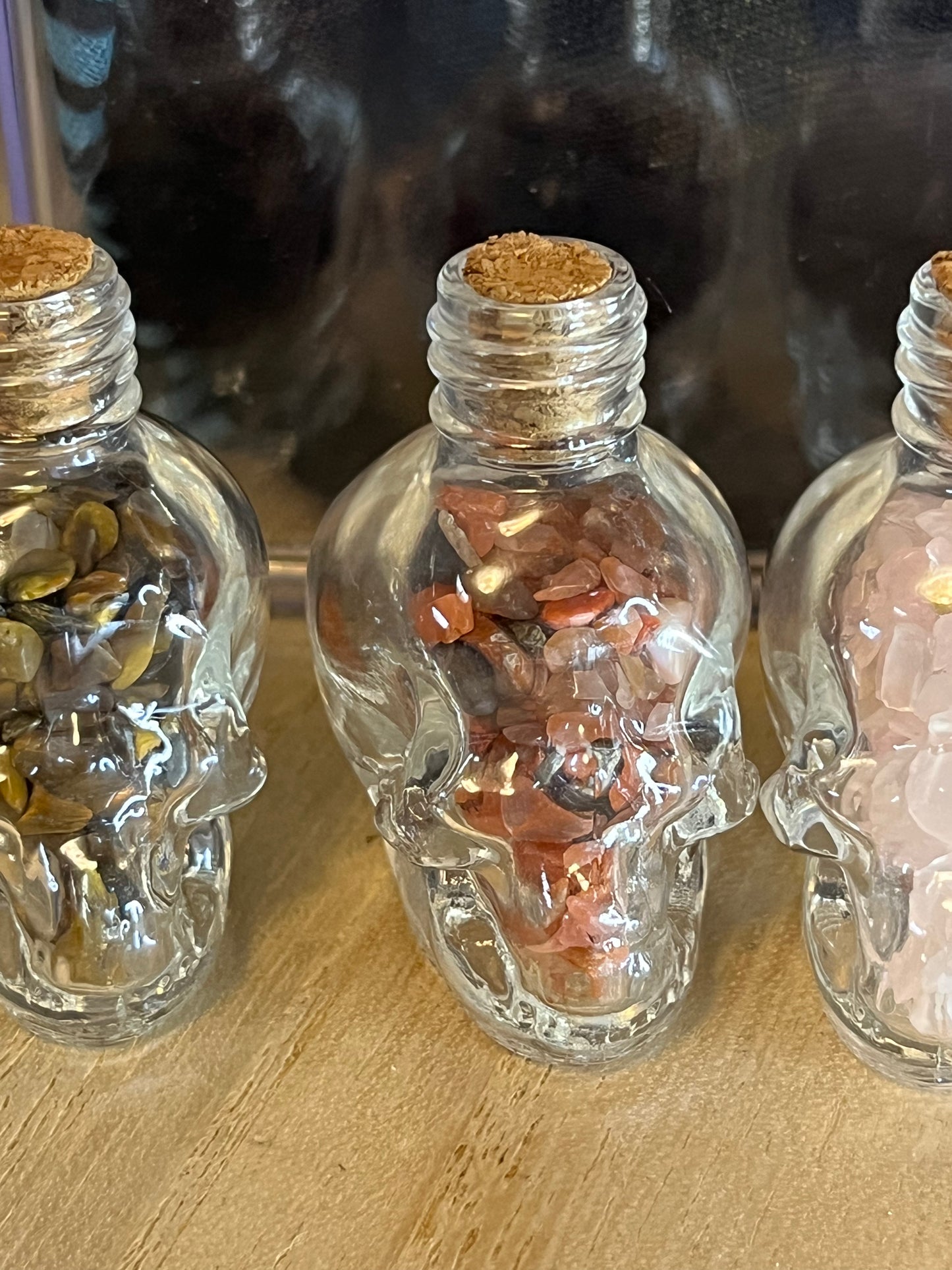 Crystal filled Skull Bottles