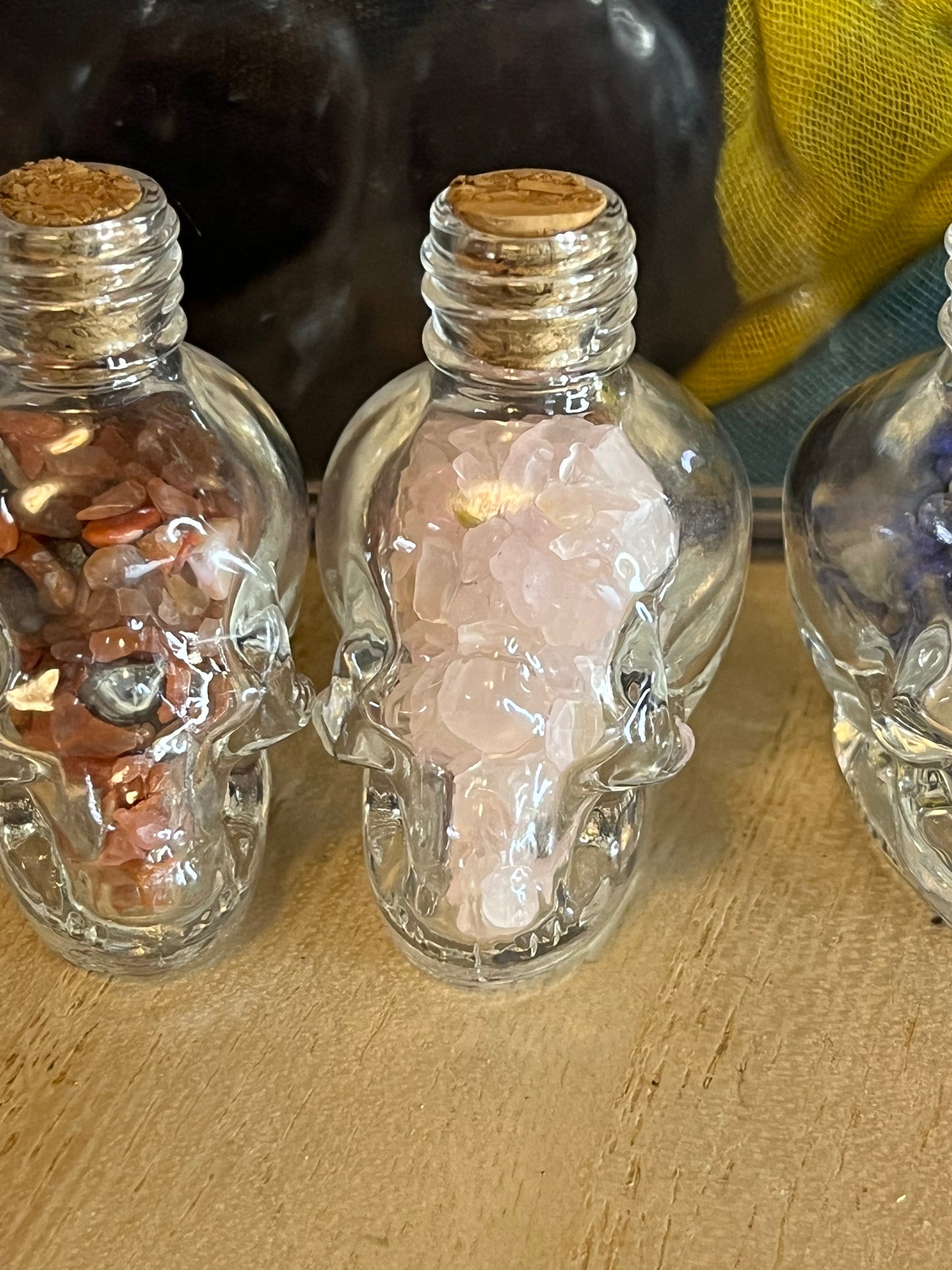 Crystal filled Skull Bottles