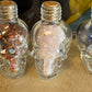 Crystal filled Skull Bottles