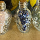 Crystal filled Skull Bottles